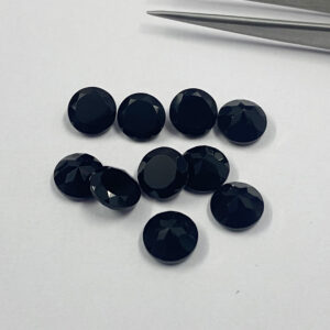black spinel faceted round cut