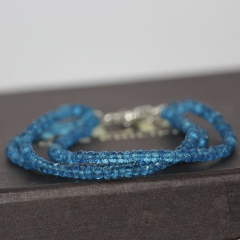 swiss blue topaz faceted rondelle beads bracelet