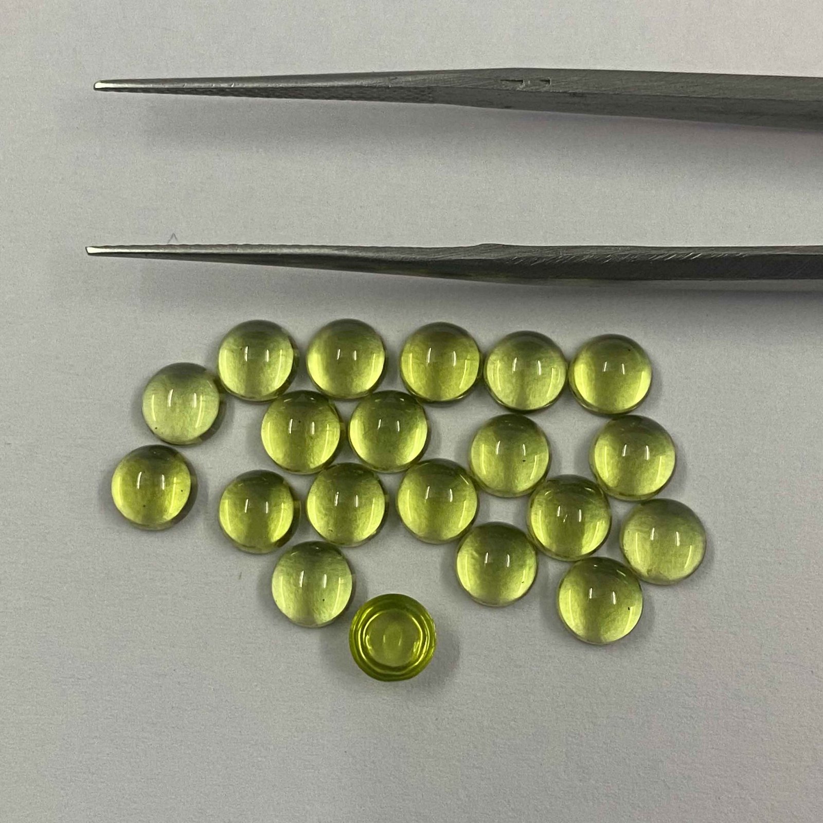 thumbnail image 2 of 4mm Natural Green Peridot Gemstone - Round Cabochon Cut - Eye Clean - Not Enhanced 2 of 2