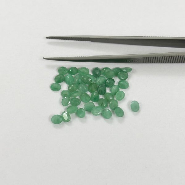 faceted emerald gems
